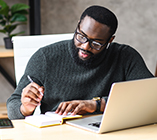 man working on laptop