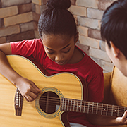 Girl playing guitar