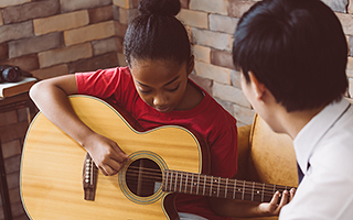 Girl playing guitar