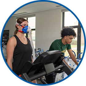 woman on treadmill with aerobic testing equipment on nose